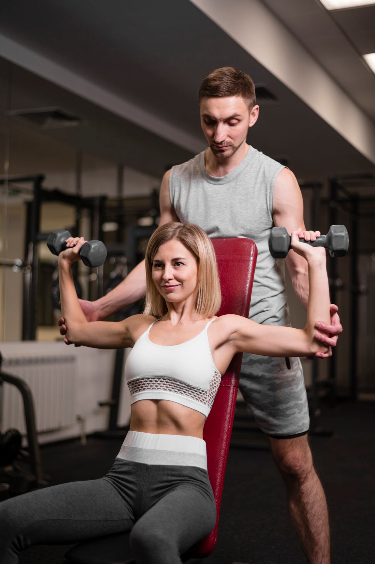 adult-man-woman-working-out-gym
